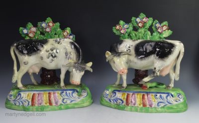 Pair Sherratt pottery cows