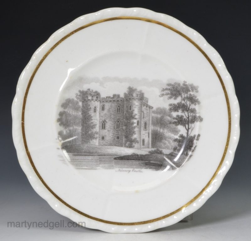 English porcelain plate decorated with a bat print of Nunney Castle, circa 1830