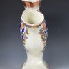 Pearlware pottery quintal vase with pratt colours and pink lustre decoration, circa 1830