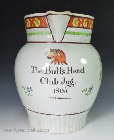 Pearlware pottery serving jug "The Bull's Head Club Jug", dated 1805