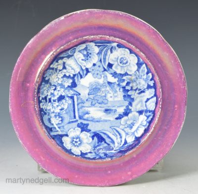 Pearlware pottery cup plate decorated with blue transfer print and pink lustre border, circa 1820