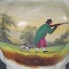 English porcelain jug decorated with cock fighting and pheasant shooting, dated 1844