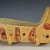 Buff pottery child's toy cradle, circa 1820