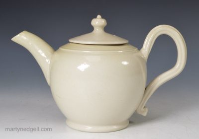 Small Staffordshire white saltglaze stoneware teapot, circa 1760