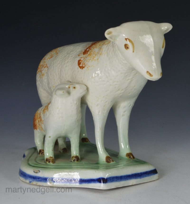 Pearlware pottery ewe and her lamb, circa 1820