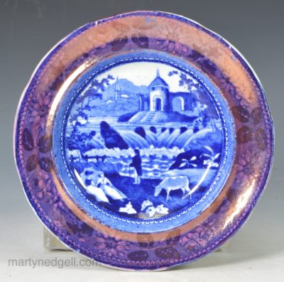 Pearlware pottery cup plate decorated with blue transfer and lustre border, circa 1820