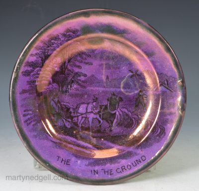 Pearlware pottery cup plate decorated with blue transfer and pink lustre, circa 1820