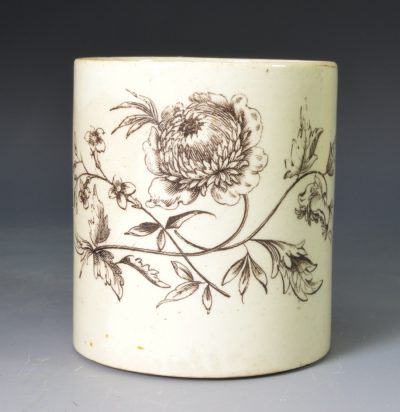 Small creamware mug or coffee can decorated with a floral print, circa 1780