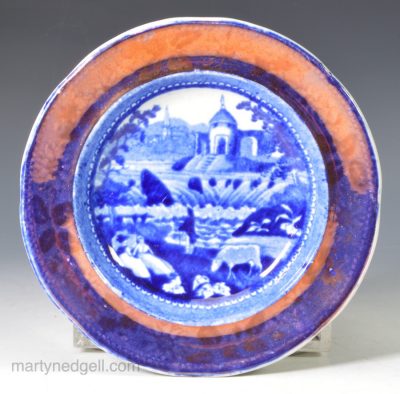 Pearlware pottery cup plate with blue transfer and pink lustre decoration, circa 1820