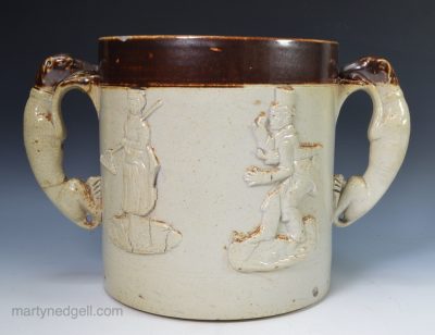 Large Derbyshire salt glaze stoneware loving cup with Paul Pry sprig, circa 1840