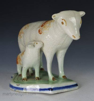 Pearlware pottery ewe and her lamb, circa 1820