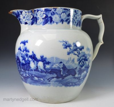Large pearlware pottery jug printed in blue transfer with a hunting scene, circa 1820