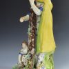 Large Staffordshire pearlware figure of the Widow and Orphans, circa 1820