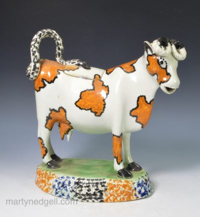 Yorkshire type prattware pottery cow creamer, circa 1820