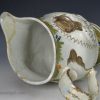 Prattware pottery jug moulded with the "Miser", circa 1820