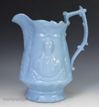 Commemorative blue pottery jug relief moulded with Peel and Cobden, circa 1850