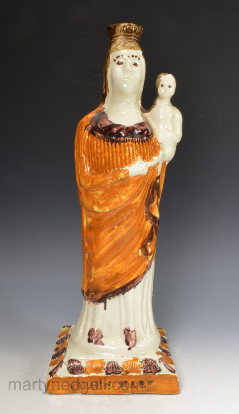 Creamware pottery model of the Virgin Mary decorated with enamels under the glaze, circa 1780