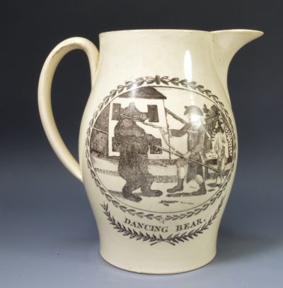 Creamware pottery jug printed with "Dancing Bear", circa 1790