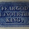 Pearlware pottery saucer decorated with underglaze transfer "Fear God Honour the King", circa 1820