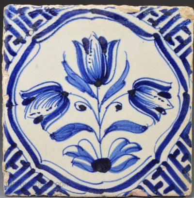 Dutch Delft tile decorated in blue with Wan Li type corners, circa 1650