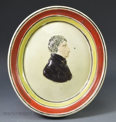 Pearlware pottery plaque of Lord John Russell decorated with overglaze enamels, circa 1830