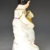 Staffordshire porcelain figure of a young girl and her cat, circa 1840