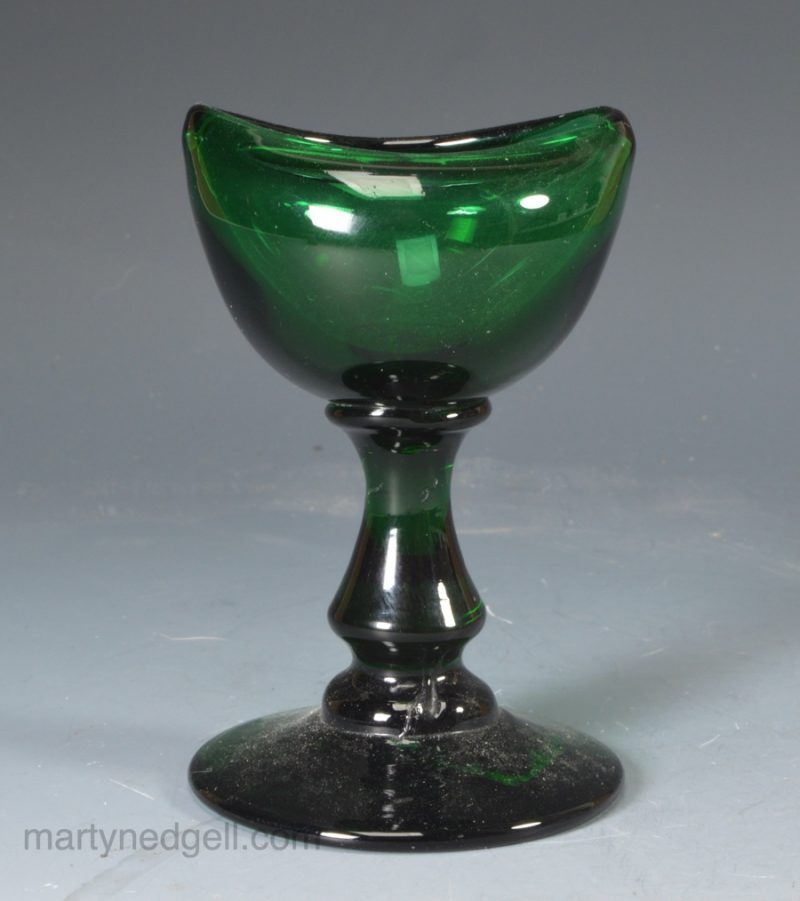 Green glass blown eye bath, circa 1850