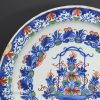 Bristol delft charger, blue red and green, circa 1740
