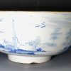 London delft bowl painted with a boy flying a kite, circa 1750