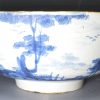 London delft bowl painted with a boy flying a kite, circa 1750