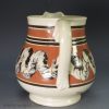 Small pearlware pottery jug decorated with mocha snail trail, circa 1830