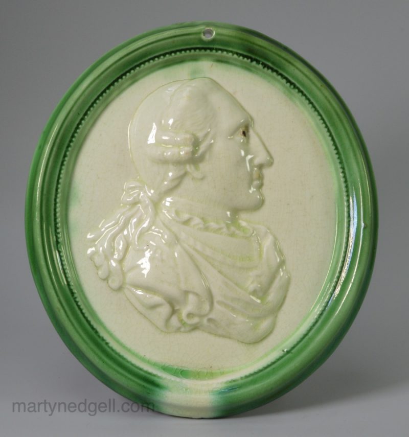 Creamware pottery plaque moulded as Louis XVI, circa 1790