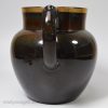 Dark brown pottery jug, circa 1800, Wilson Pottery Staffordshire