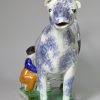 Pottery cow creamer decorated with high fired enamels under a pearlware glaze, prattware, circa 1820