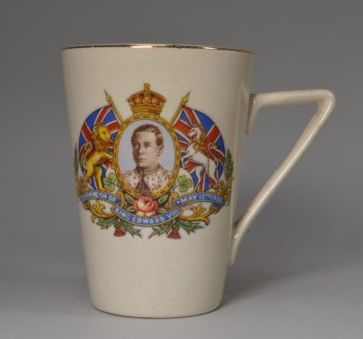 Tall pottery cup commemorating the coronation of Edward VIII due to be on the 12th May 1937