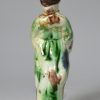 Creamware pottery figure of a girl, circa 1790