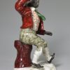 Staffordshire porcelain figure of T. E Rice in the part of Jim Crow, circa 1840