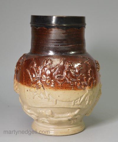 London saltglaze stoneware jug decorated with a panel of Midnight Modern Conversation, circa 1790, probably Mortlake