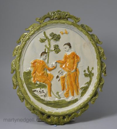 Prattware pottery plaque “Paris and Aphrodite” decorated with high fired enamels under the pearlware glaze, circa 1810