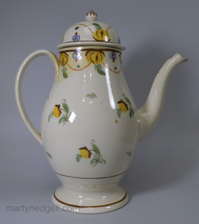 Prattware pottery coffee pot decorated with high fired enamels under a pearlware glaze, circa 1820