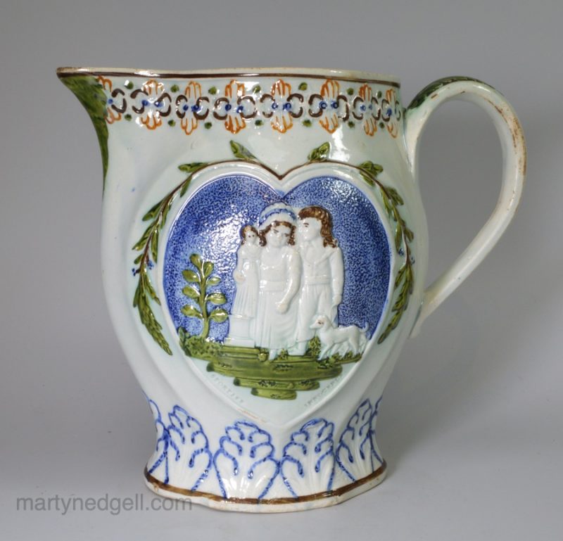 Prattware pottery jug moulded with "Sportive Innocence" and "Mischievous Sport", circa 1820