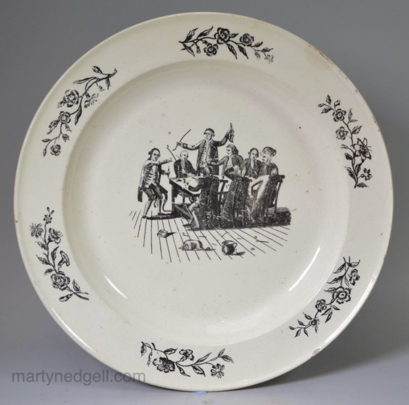 Creamware pottery plate printed with a drinking party, circa 1790