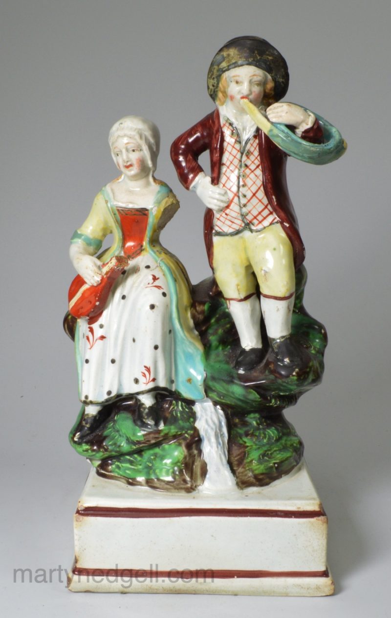 Staffordshire pearlware pottery figure of musicians, circa 1820