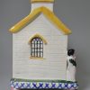 Large prattware pottery money box and bible belonging to Mary Ann Allan from Louth in Lincolnshire, circa 1842