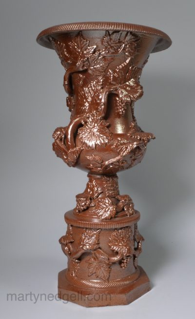 Saltglaze stoneware urn on a plinth, circa 1850, possibly continental