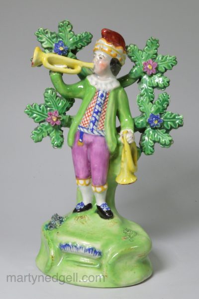Staffordshire pearlware pottery bocage figure of trumpeter, circa 1820 Walton