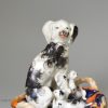 Staffordshire porcelain spaniel and pups, circa 1840