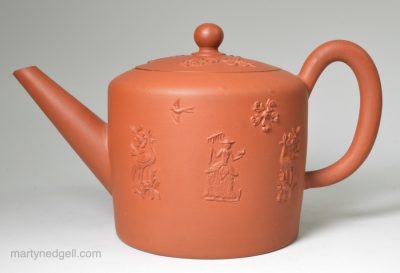 Staffordshire red stoneware teapot with Farmer and Farmer's wife sprigs, circa 1770