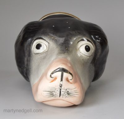 Porcelain hound's head stirrup cup, circa 1850
