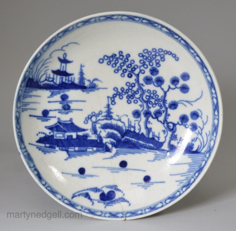 Worcester porcelain saucer painted with the cannonball pattern, circa 1765